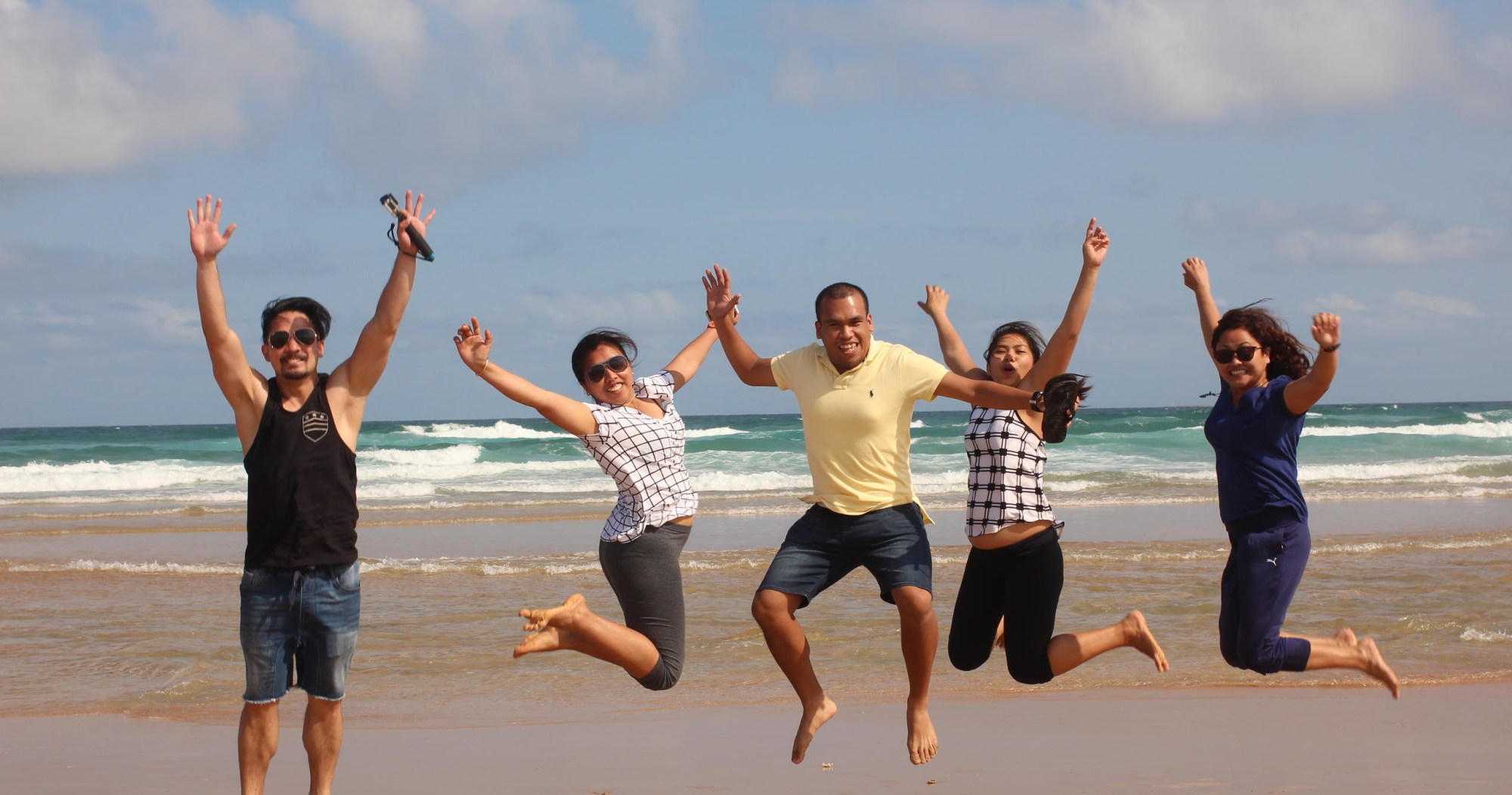 a group of people on a beach